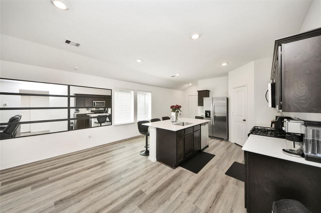 1010 Muscadine Vine Lane, Houston, TX 77090