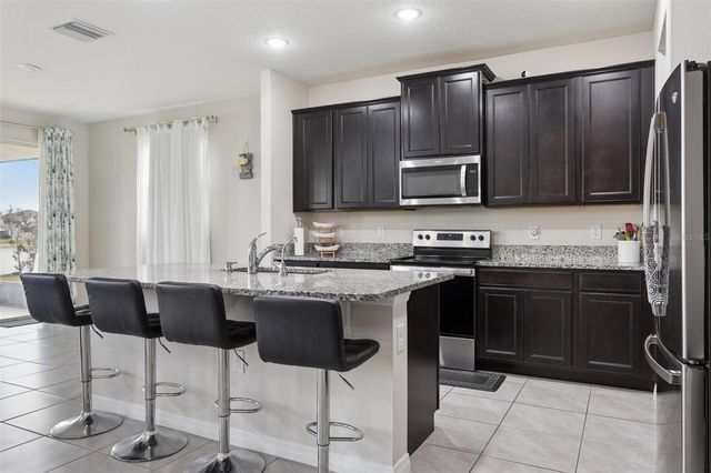 9119 FORGE BREEZE LOOP, Wesley Chapel, FL 33545