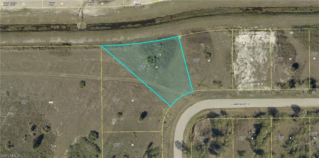 933 Commodore ST, LEHIGH ACRES, FL 33974 — exterior
