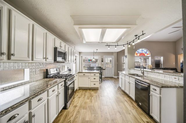 23146 Willow Canyon Drive, Katy, TX 77494