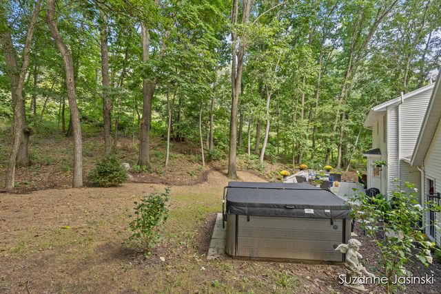 3597 Riverwoods Drive Ne, Plainfield Twp, MI 49341