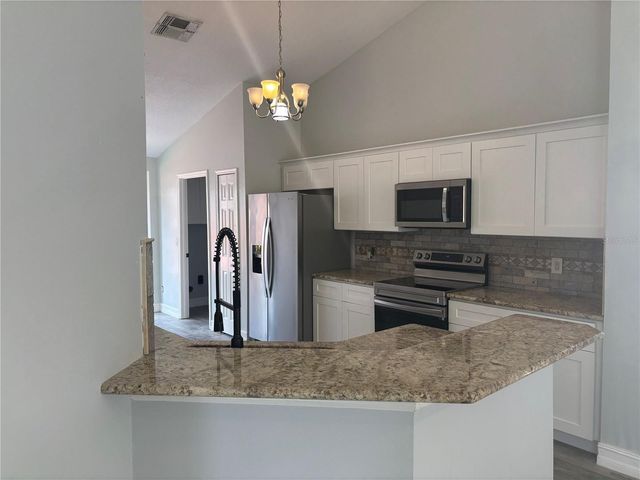 2830 STRAND CIRCLE, Oviedo, FL 32765