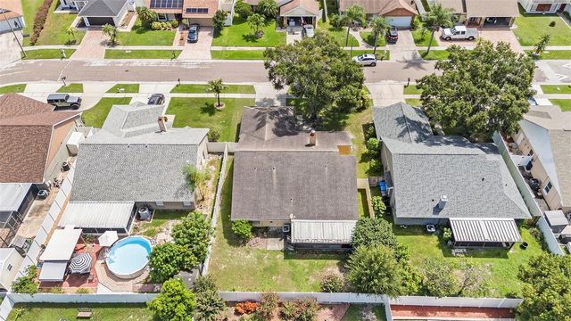 7112 HOLLOWELL DRIVE, Tampa, FL 33634