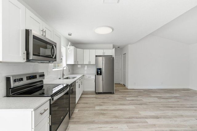 16246 E Cornwall Drive, The Acreage, FL 33470