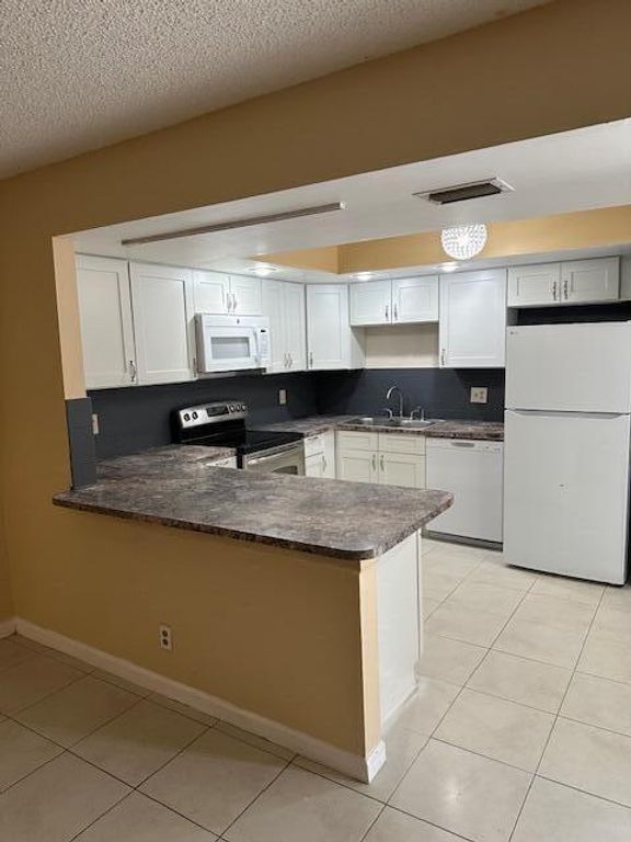 Image 29 of property listing at 11983 Shakerwood Lane, Wellington, FL 33414