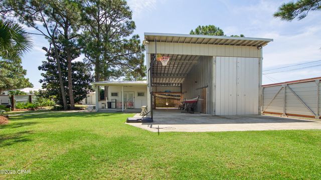7425 S Lagoon Drive, Panama City, FL 32408