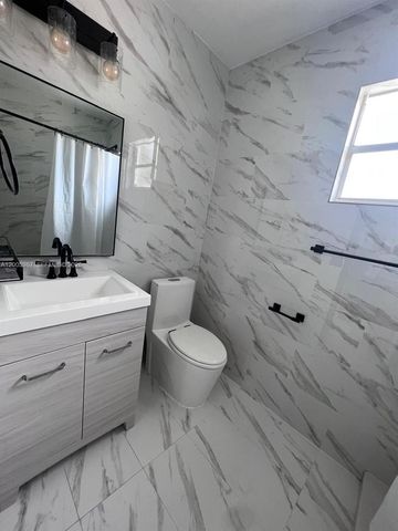 311 NW 32nd Ct, Miami, FL 33125