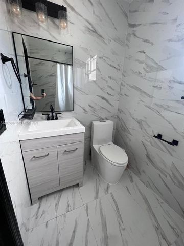 311 NW 32nd Ct, Miami, FL 33125