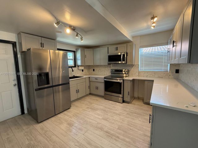 311 NW 32nd Ct, Miami, FL 33125