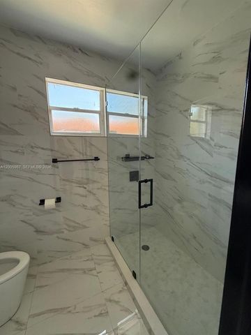 311 NW 32nd Ct, Miami, FL 33125