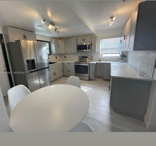 311 NW 32nd Ct, Miami, FL 33125