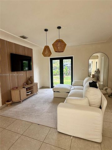 311 NW 32nd Ct, Miami, FL 33125