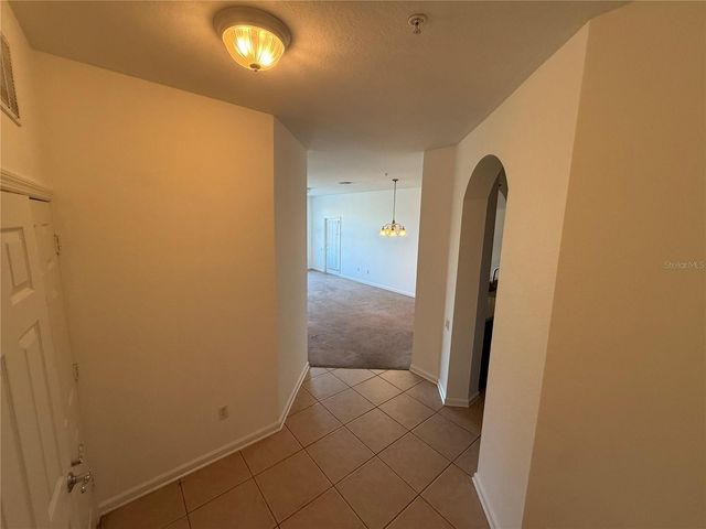 3332 ROBERT TRENT JONES DR 40503, Orlando, FL 32835