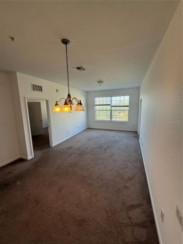 3332 ROBERT TRENT JONES DR 40503, Orlando, FL 32835