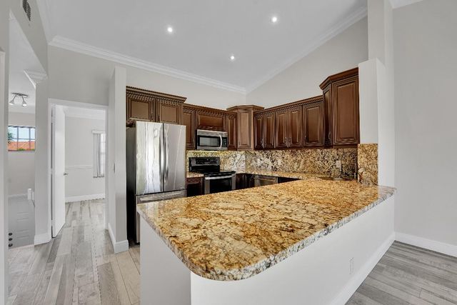 704 Freedom Court, Deerfield Beach, FL 33442