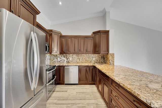 704 Freedom Court, Deerfield Beach, FL 33442