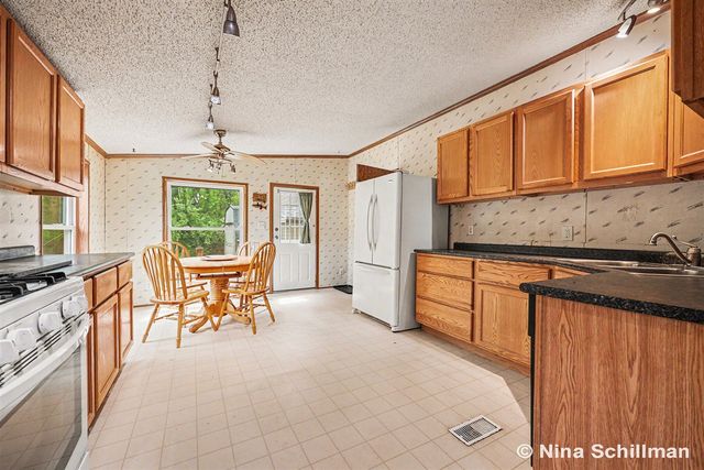 12150 Woodland Park Drive, Belding, MI 48809