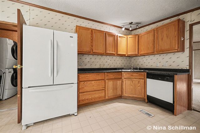 12150 Woodland Park Drive, Belding, MI 48809