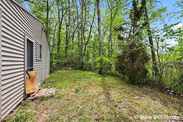 12150 Woodland Park Drive, Belding, MI 48809