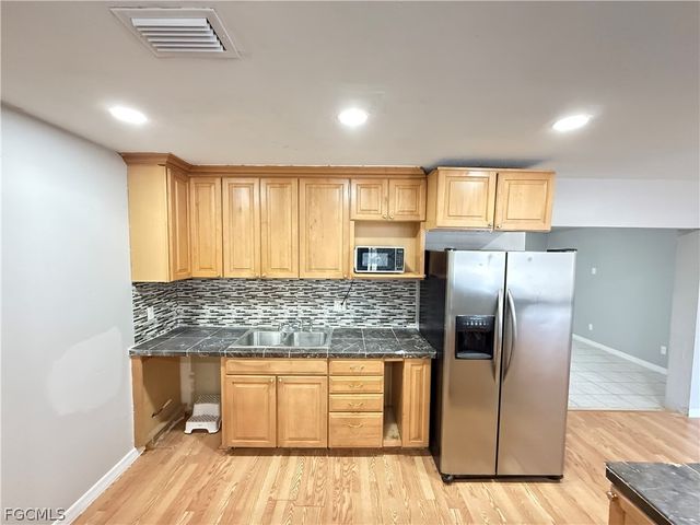 403 Cactus CIR, Lehigh Acres, FL 33936