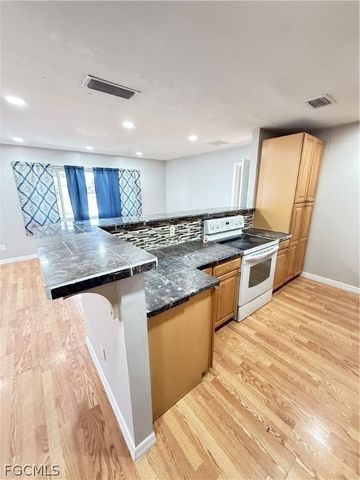 403 Cactus CIR, Lehigh Acres, FL 33936