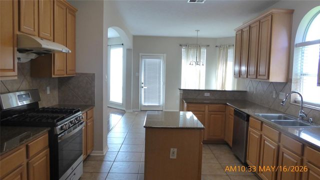 10142 Lazy Lagoon, Houston, TX 77065
