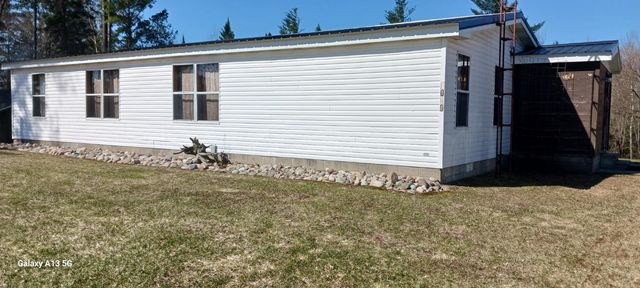 1080 Beach Road, Logan Twp, MI 48756
