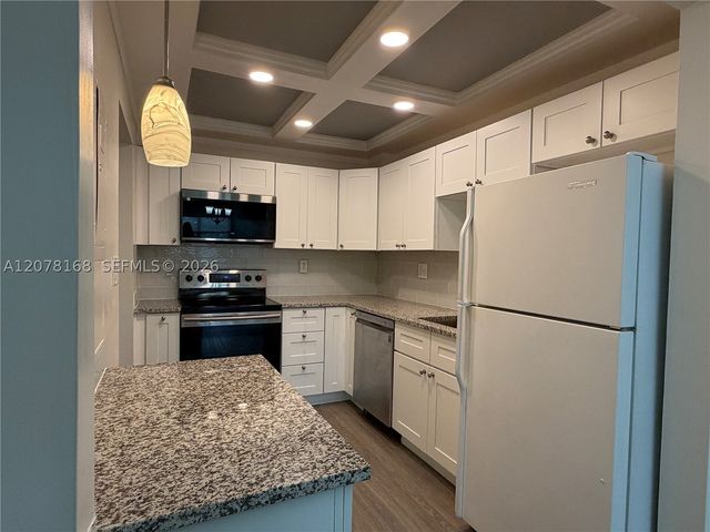 301 Racquet Club Rd 210, Weston, FL 33326