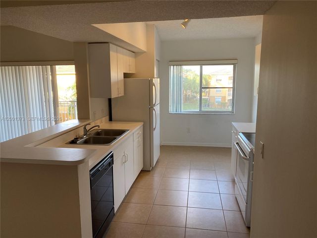 9645 NW 1st Court 1302, Pembroke Pines, FL 33024