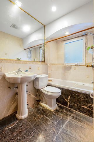 7141 Loubet Street, Forest Hills, NY 11375