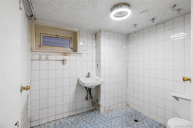 7141 Loubet Street, Forest Hills, NY 11375