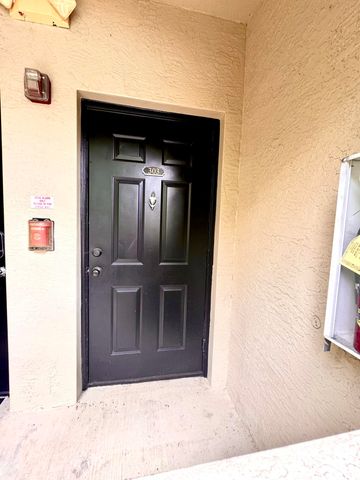 5840 W SAMPLE Road 303, Coral Springs, FL 33067