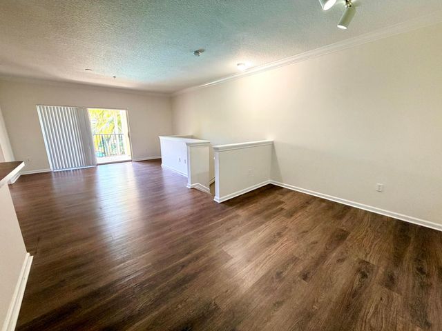 5840 W SAMPLE Road 303, Coral Springs, FL 33067