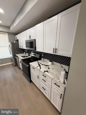 215 N CURLEY ST, Baltimore, MD 21224