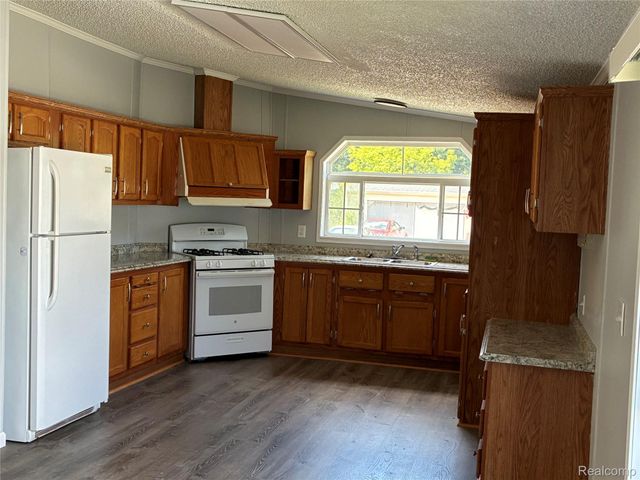 420 Hidden Ridge, Morrice Village, MI 48857