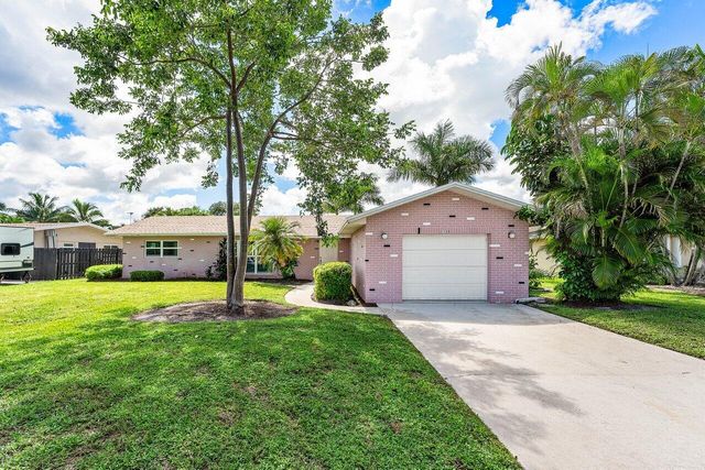 128 Sandpiper Avenue, Royal Palm Beach, FL 33411