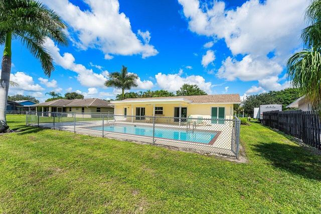 128 Sandpiper Avenue, Royal Palm Beach, FL 33411