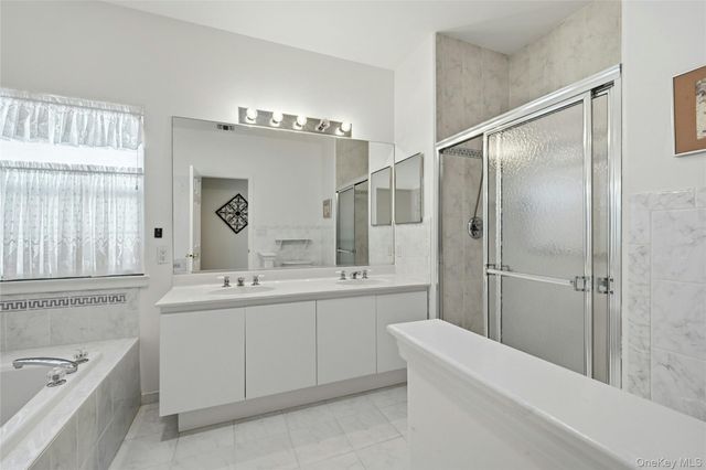 10 Sagaponack Court 10, Ridge, NY 11961