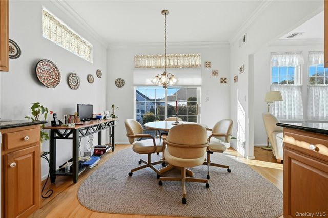 10 Sagaponack Court 10, Ridge, NY 11961