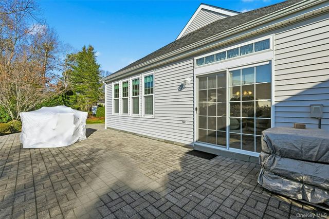 10 Sagaponack Court 10, Ridge, NY 11961