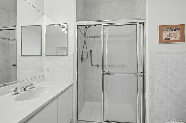 10 Sagaponack Court 10, Ridge, NY 11961