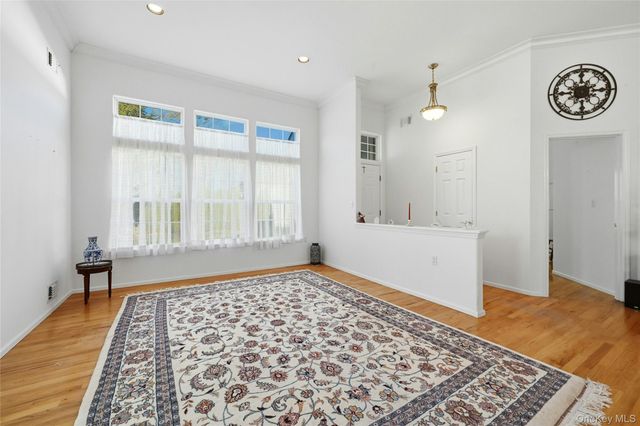 10 Sagaponack Court 10, Ridge, NY 11961