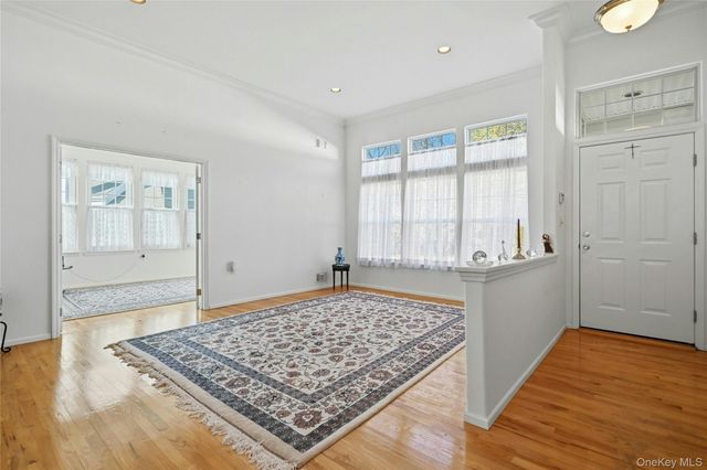 10 Sagaponack Court 10, Ridge, NY 11961