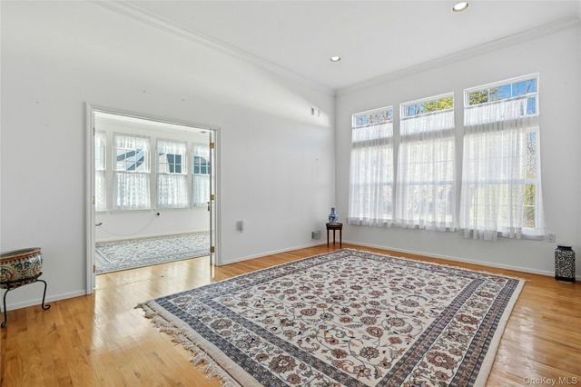 10 Sagaponack Court 10, Ridge, NY 11961