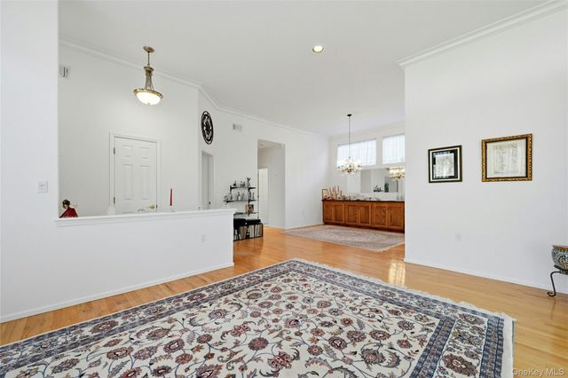 10 Sagaponack Court 10, Ridge, NY 11961