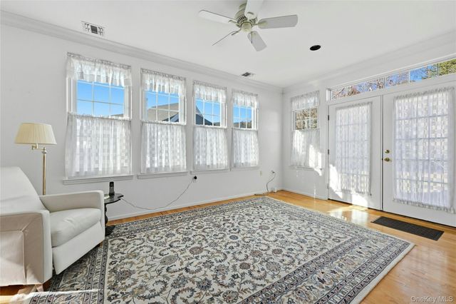 10 Sagaponack Court 10, Ridge, NY 11961