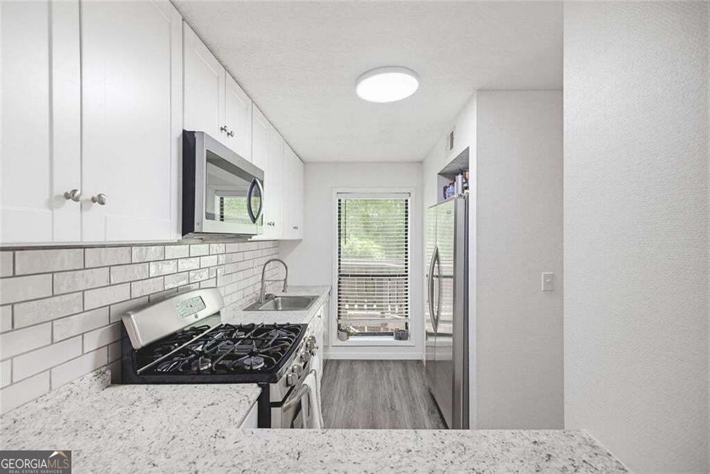 703 Woodcliff Drive, Sandy Springs, GA 30350 — photo 2