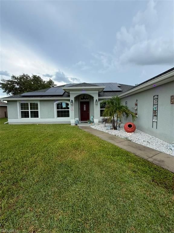 919 NE 36th TER, CAPE CORAL, FL 33909 — photo 2