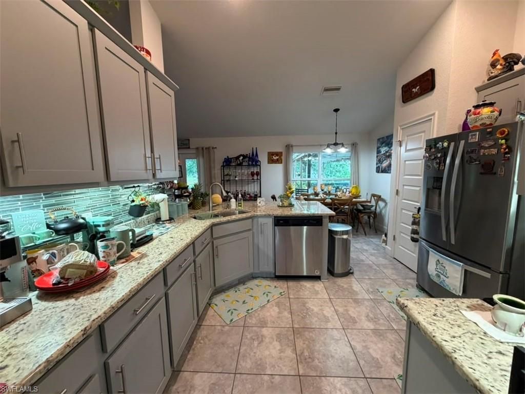 919 NE 36th TER, CAPE CORAL, FL 33909 — photo 3