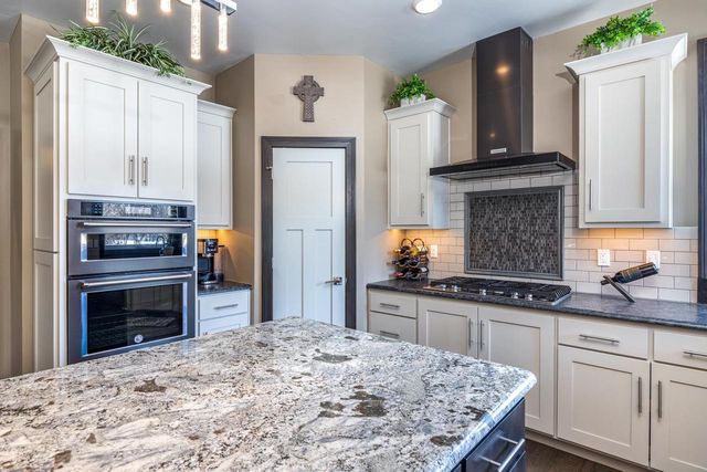 405 WOODFIELD PRAIRIE WAY, Hobart, WI 54155